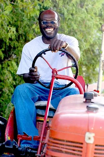 Jamaican Shirley Wright loves his job and loves Canada.