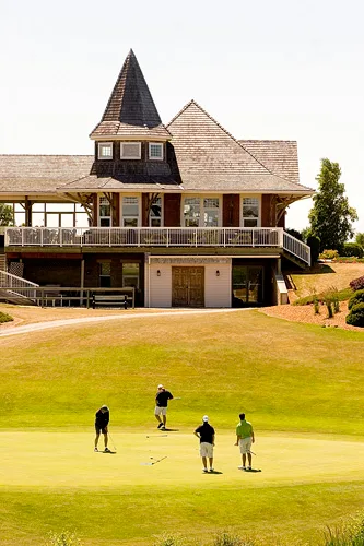 Hecklers sometimes gather on the deck of the clubhouse facing the 18th hole at Widder Station